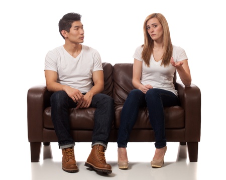 Young Couple on Sofaの写真素材