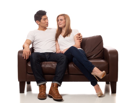 Young Couple on Sofaの写真素材