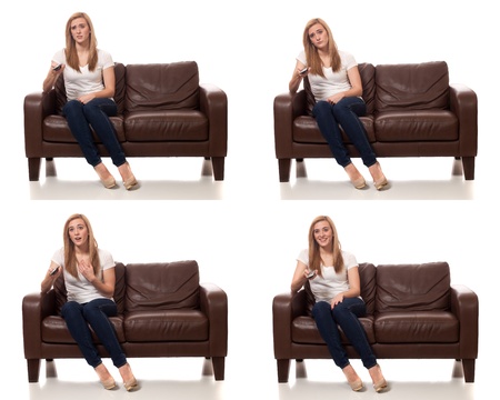 Young Woman Watching Televisionの写真素材