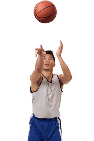 Male basketball player. Studio shot over white.の写真素材