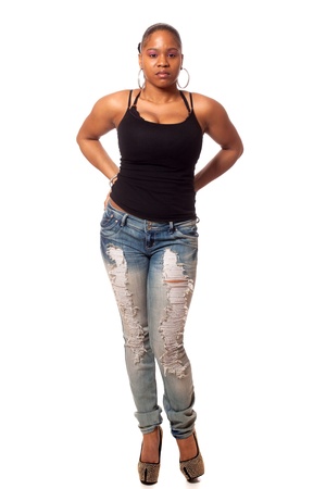 Casual young woman. Studio shot over white.の写真素材