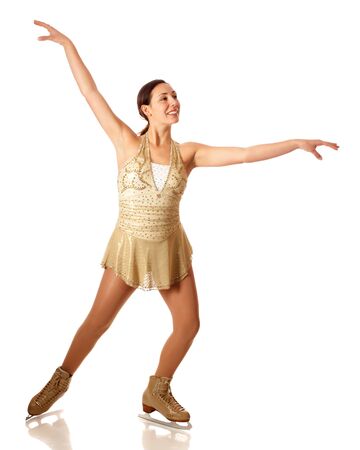 Young adult figure skater. Studio shot over white.の写真素材