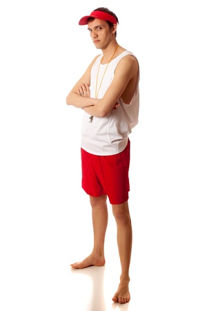 Young adult male lifeguard. Studio shot over white.の写真素材