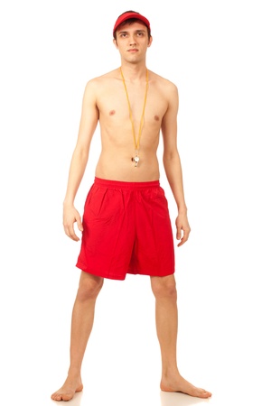 Young adult male lifeguard. Studio shot over white.の写真素材