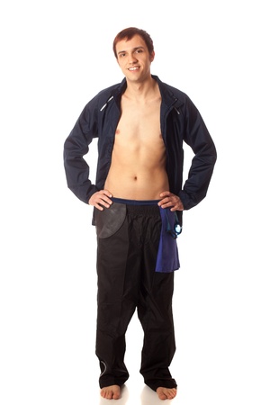 Young adult male swimmer. Studio shot over white.の写真素材
