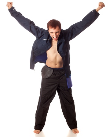 Young adult male swimmer cheering on teammates. Studio shot over white.の写真素材