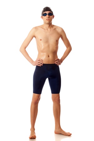 Young adult male swimmer. Studio shot over white.の写真素材