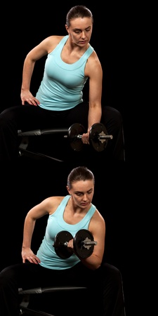 Concentration curl exercise  Studio shot over black の写真素材