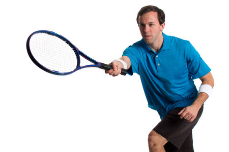 Young adult male tennis player. Studio shot over white.の写真素材
