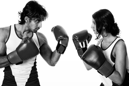 Male and female boxers  Battle of the sexes   Studio shot over white の写真素材