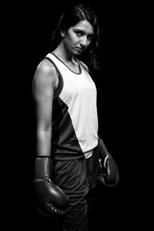 Female boxer  Studio shot over white の写真素材