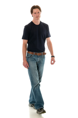 Casual young adult man. Studio shot over white.の写真素材