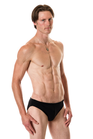 Man in swimwear. Studio shot over white.の写真素材
