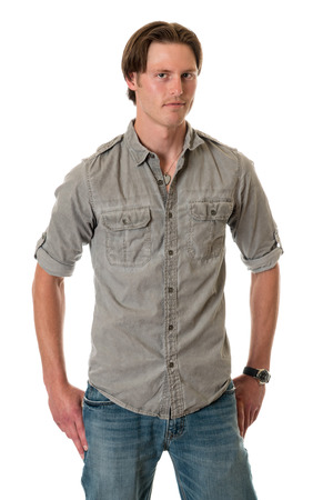Casual young adult man. Studio shot over white.の写真素材