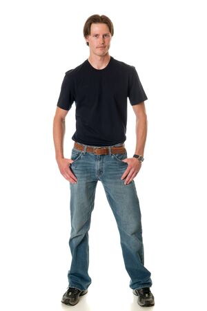 Casual young adult man. Studio shot over white.の写真素材