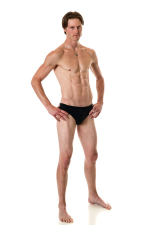 Man in swimwear. Studio shot over white.の写真素材
