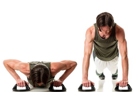 Push up exercise. Studio shot over white.の写真素材