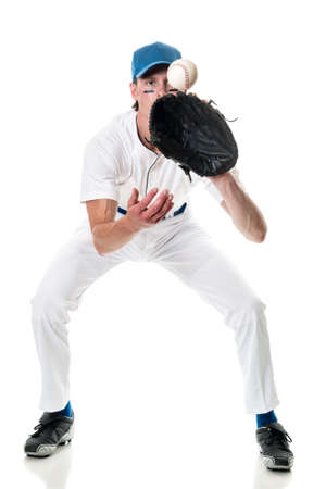 Young adult baseball player. Studio shot over white.の写真素材