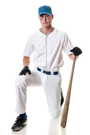 Young adult baseball player. Studio shot over white.の写真素材