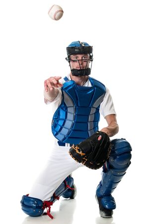 Young adult baseball player. Studio shot over white.の写真素材