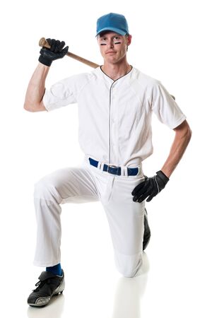 Young adult baseball player. Studio shot over white.の写真素材