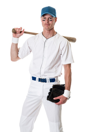 Young adult baseball player. Studio shot over white.の写真素材