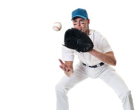 Young adult baseball player. Studio shot over white.の写真素材