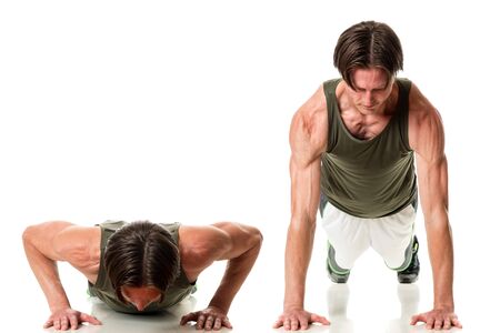 Push up exercise. Studio shot over white.の写真素材