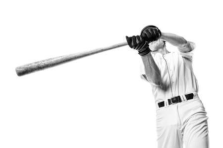 Young adult baseball player. Studio shot over white. Black and white.の写真素材