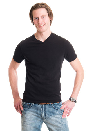 Man in jeans and black tee shirt. Studio shot over white.の写真素材