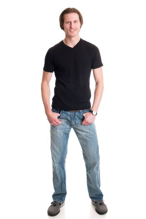 Man in jeans and black tee shirt. Studio shot over white.の写真素材