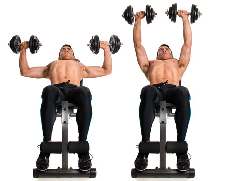 Dumbbell Chest Press. Studio composite over white.の写真素材