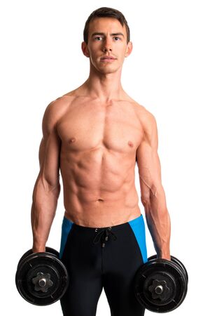 Athletic man with dumbbells. Studio shot over white.の写真素材
