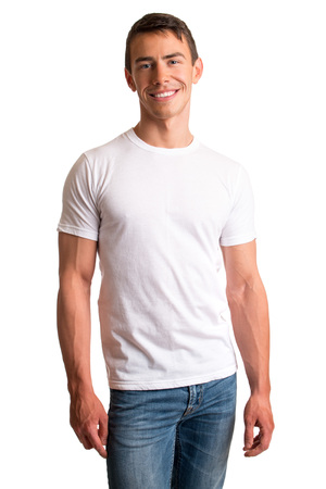 Young man in jeans and tee shirt. Studio shot over white.の写真素材