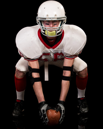 American football player. Studio shot over black.の写真素材