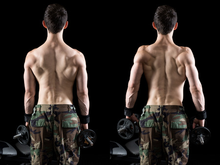 Dumbbell shrug exercise. Studio shot over black.の写真素材