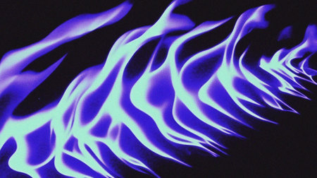 Abstract background of blue and purple fire flames on a black background.の写真素材