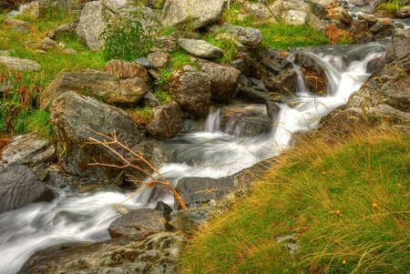 beautiful cascade in the morning light,  HDR. Long exposure time gives an の写真素材