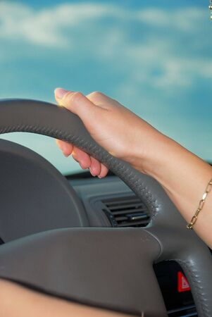 steering wheel in hand