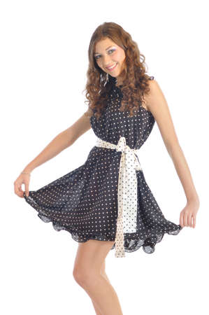 Happy smiling young girl with retro dress. isolated on whiteの写真素材
