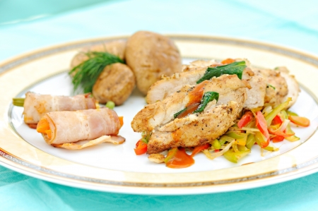 meal with prepared chicken meat and vegetablesの写真素材