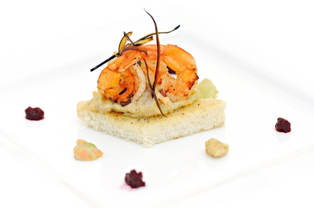 healthy meal with cooked shrimps, bread and vegetablesの写真素材