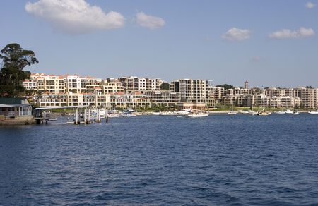 Waterfront apartments overlooking the waterの写真素材