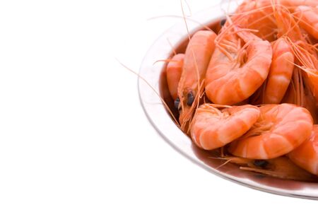 Side shot of prawns in a metal bowlの写真素材