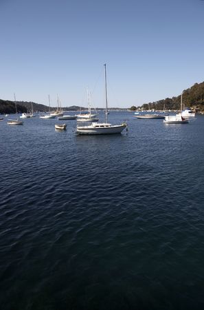 Boats anchored in a sheltered bayの写真素材