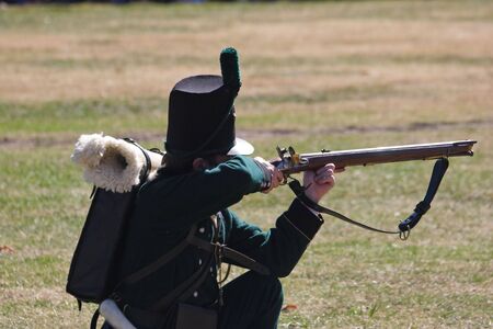 Period soldier taking aimの写真素材