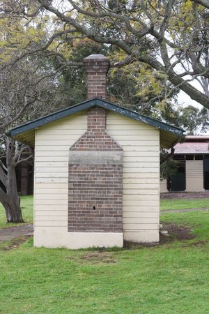 A building with a brick chimney stackの写真素材
