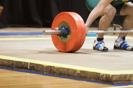 A weightlifter about to liftの写真素材