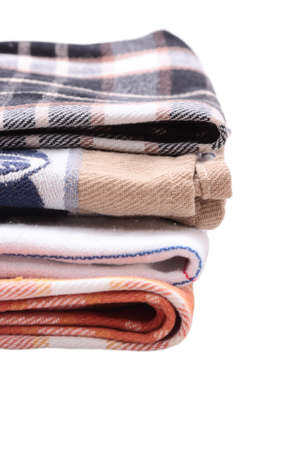 A stack of tea towels on a white backgroundの写真素材