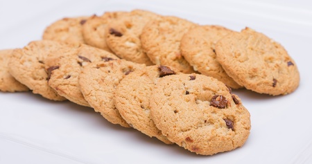 Two rows of cookies laid out on a plateの写真素材